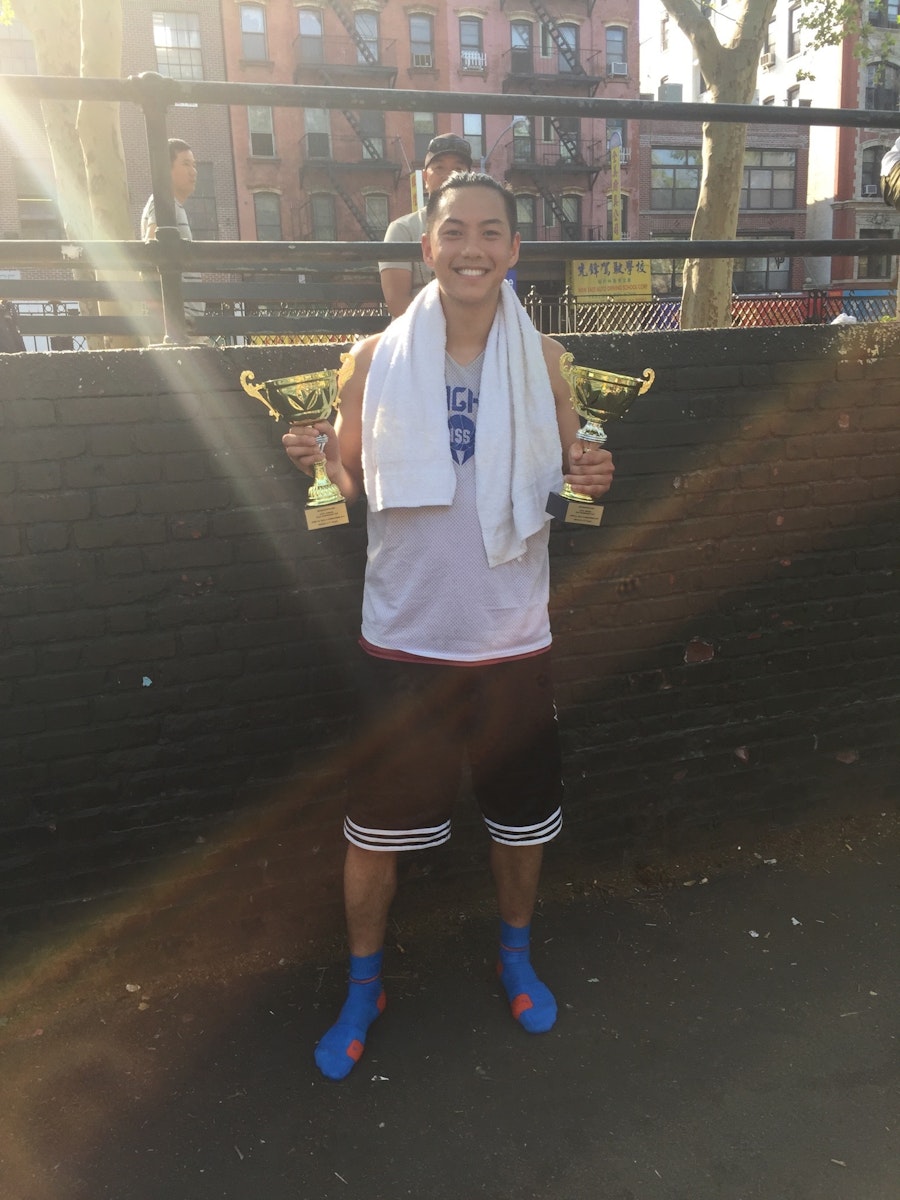 Peter with his trophies after a basketball game